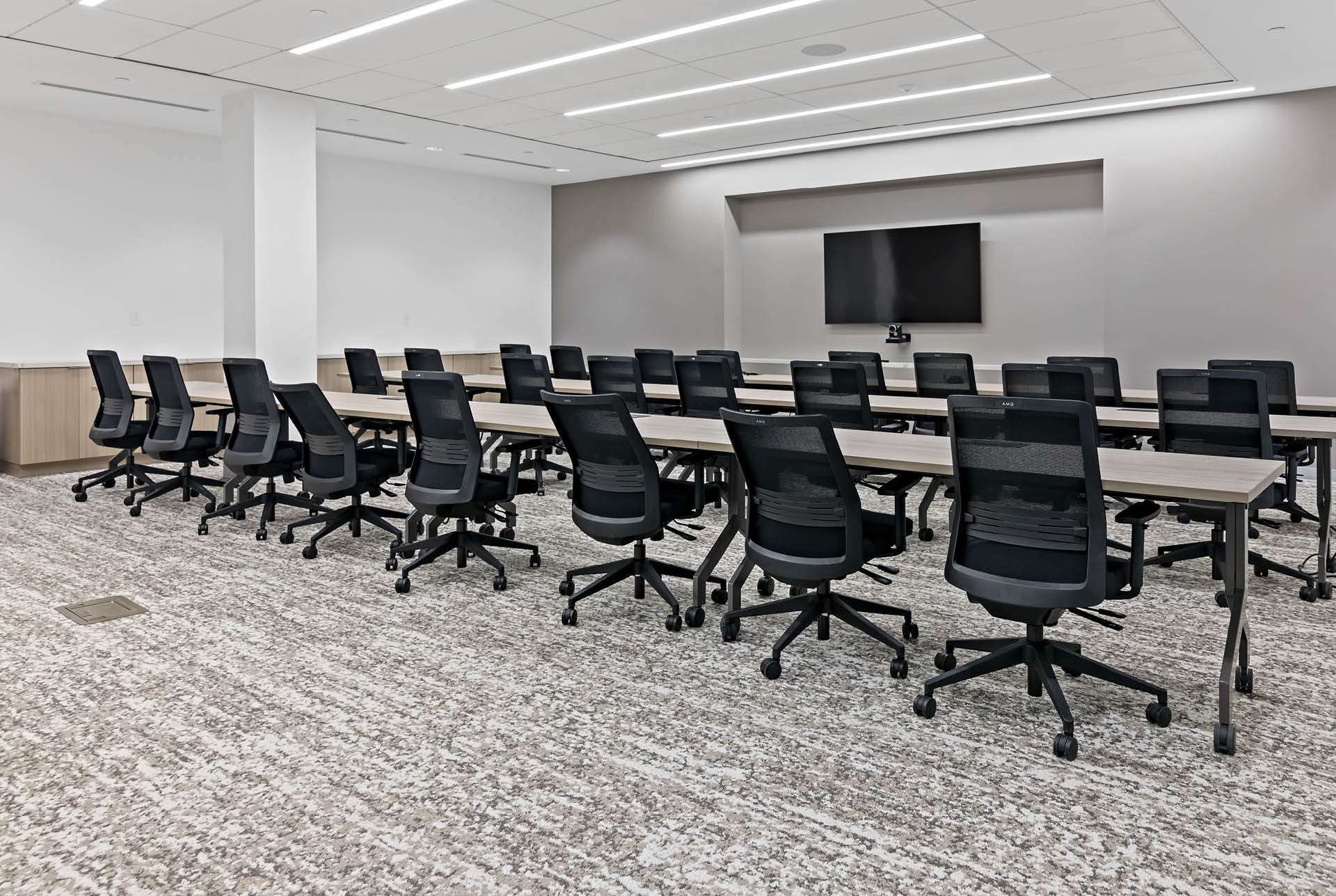 Renovated indoor conference room amenity space.